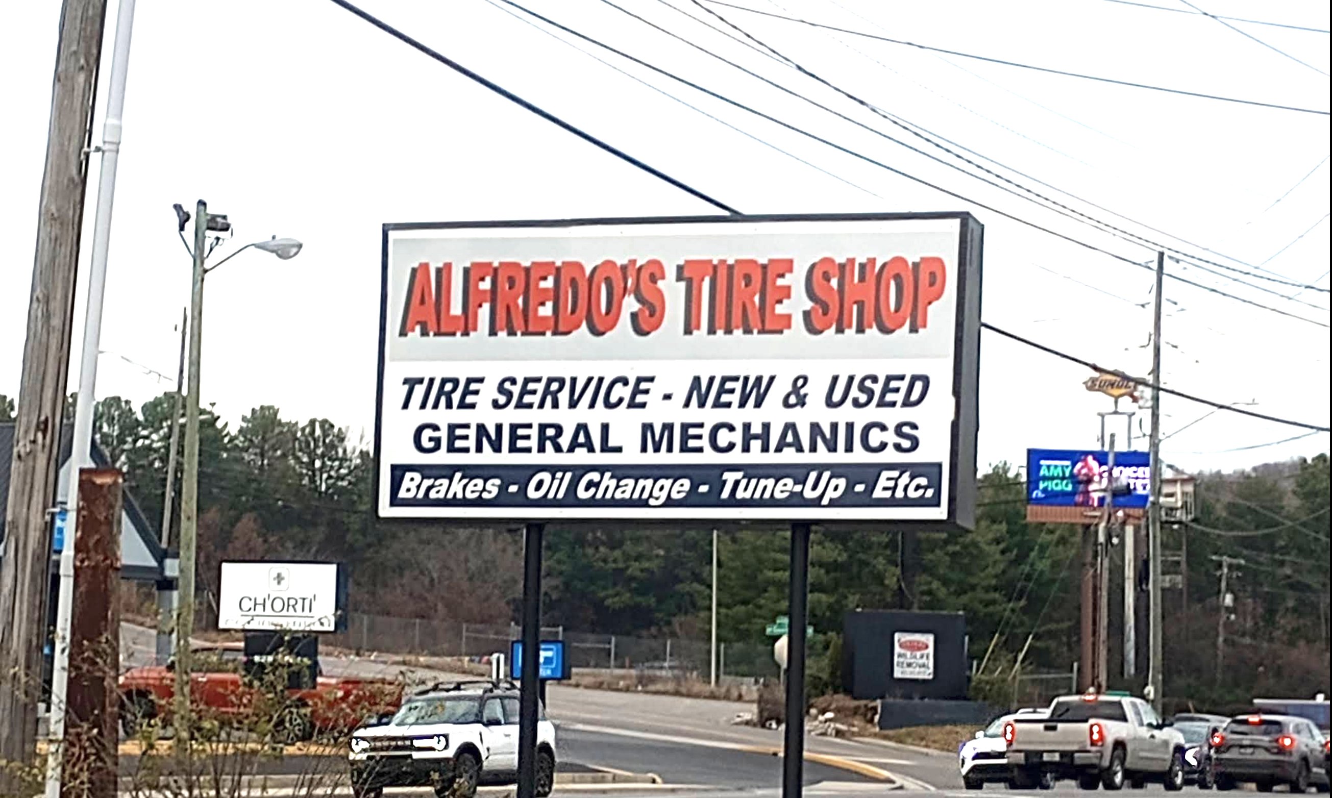 Alfredo's Tire Shop road sign
